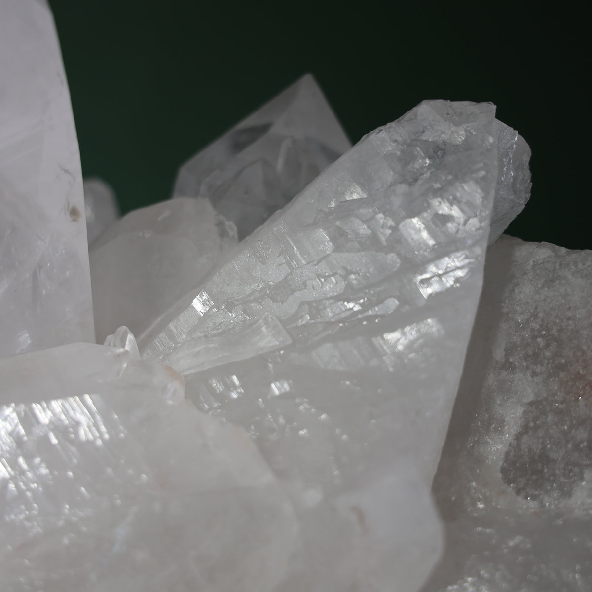 View of the natural matrix beneath the many quartz points